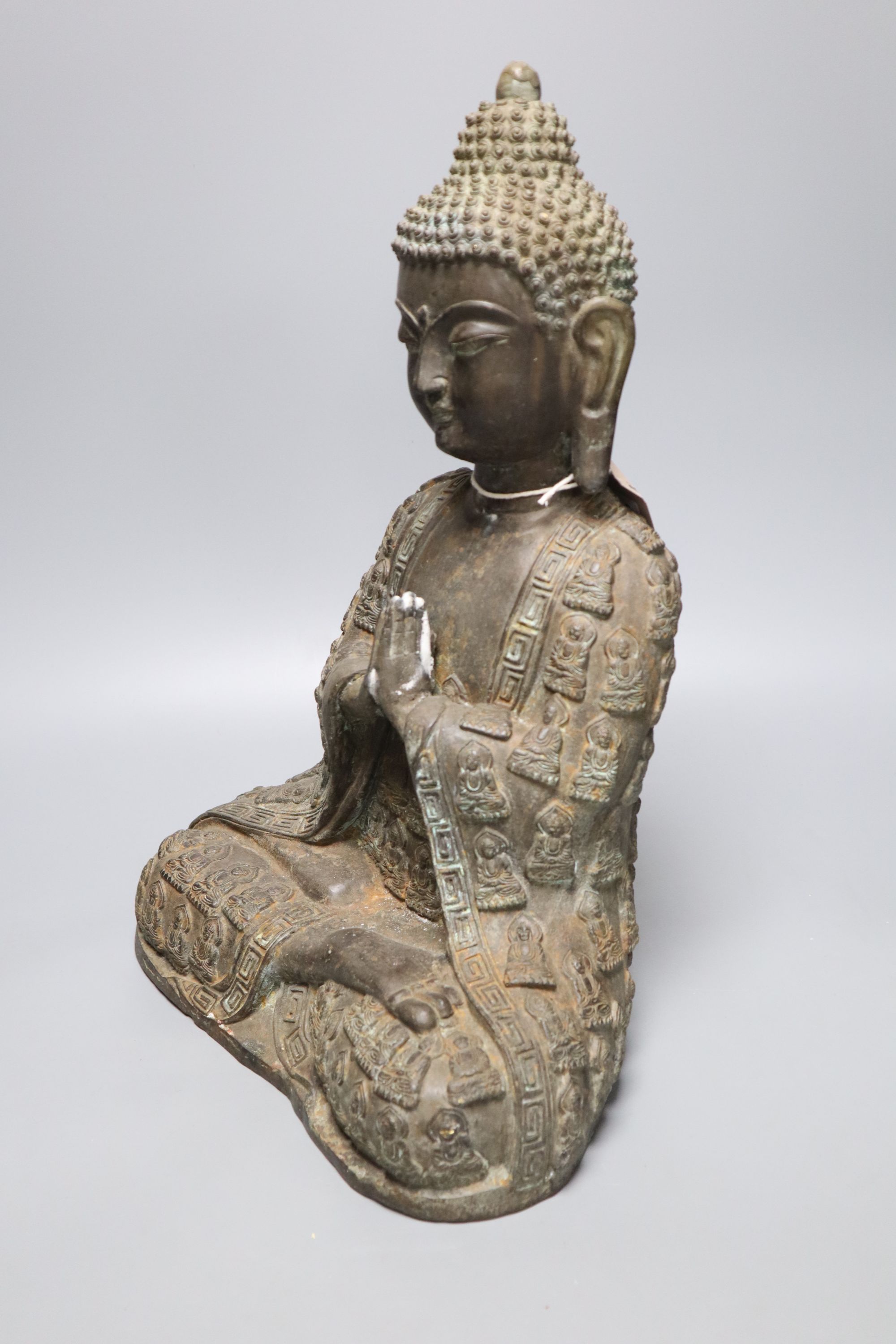 A large bronze seated figure of Buddha, height 44cm
